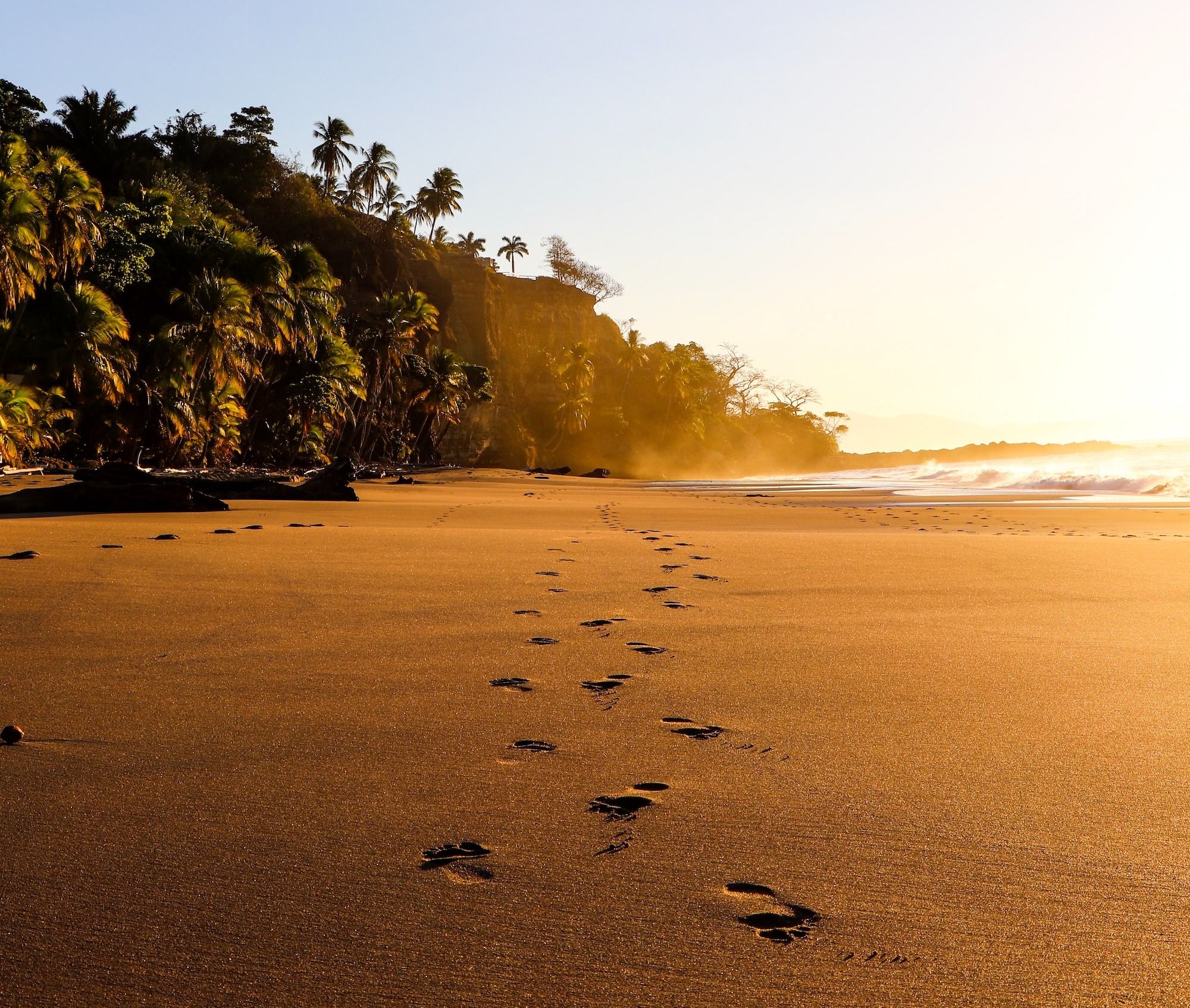 foot step on sand during daytime