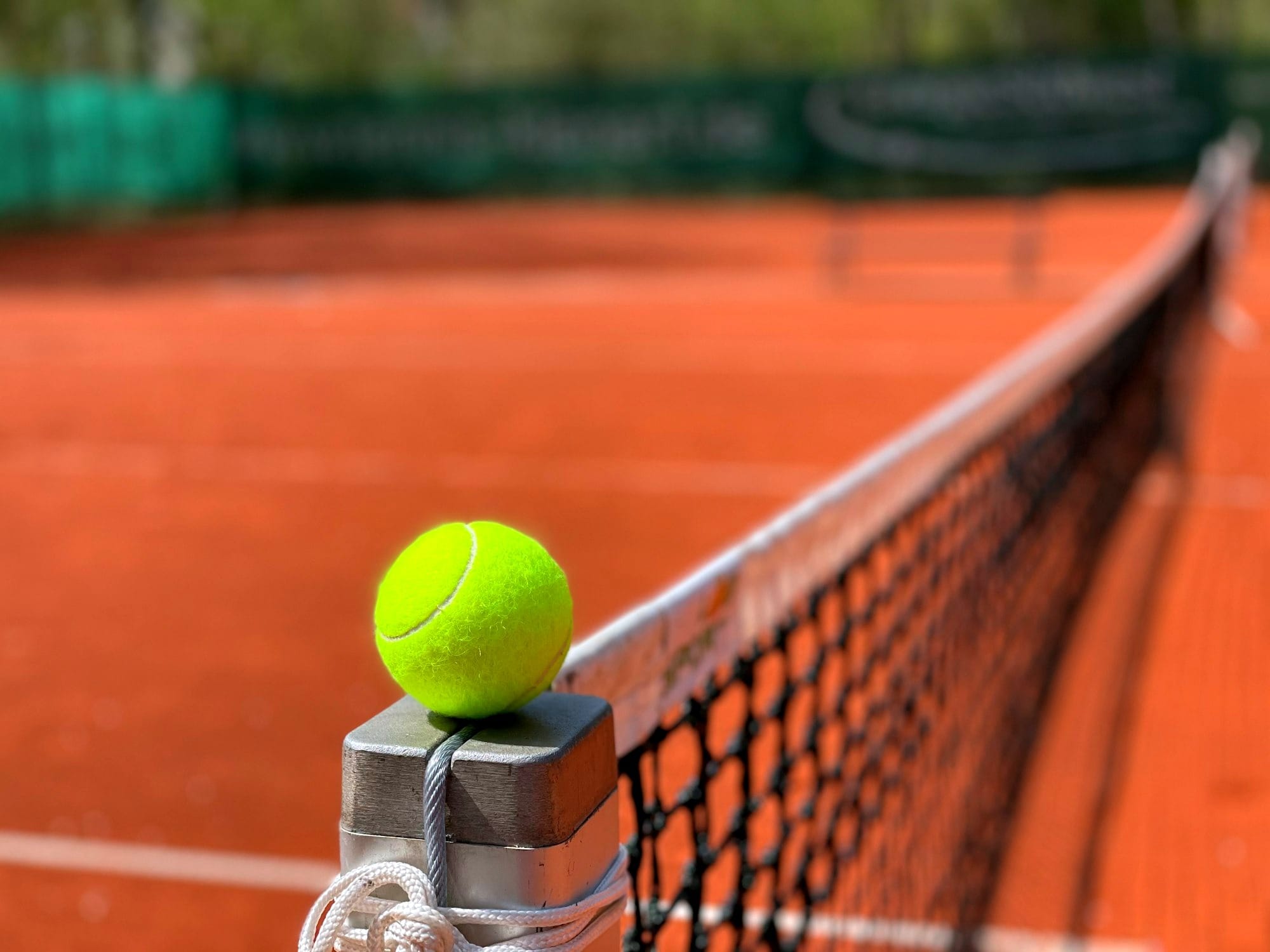 tennis ball on tennis court
